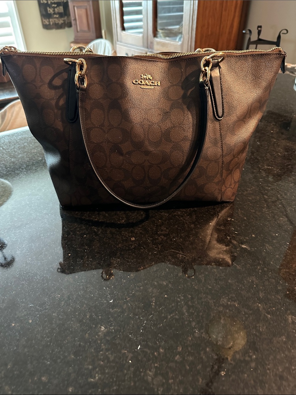 Coach Dark Brown Signature Tote with Gold Hardware.  Wear as shown in one handle